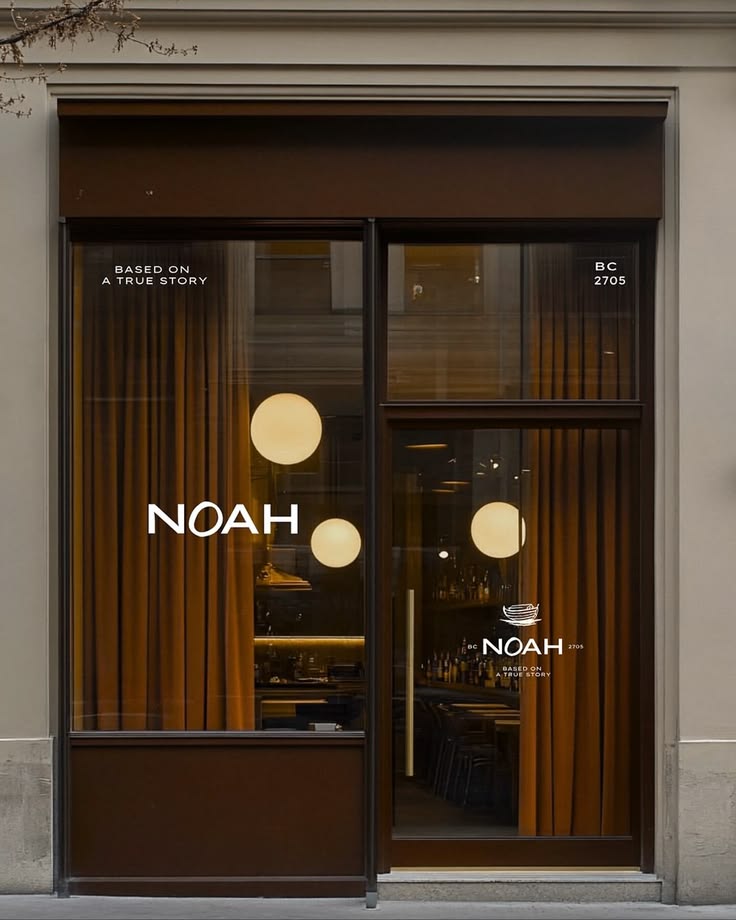 Minimalist boutique with monogram blade sign